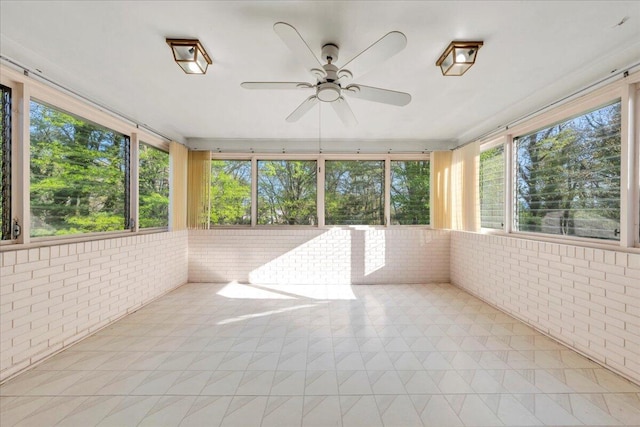 5241 N Spring Dr, Roanoke, VA 24019 - unfurnished sunroom with brick wall and ceiling fan