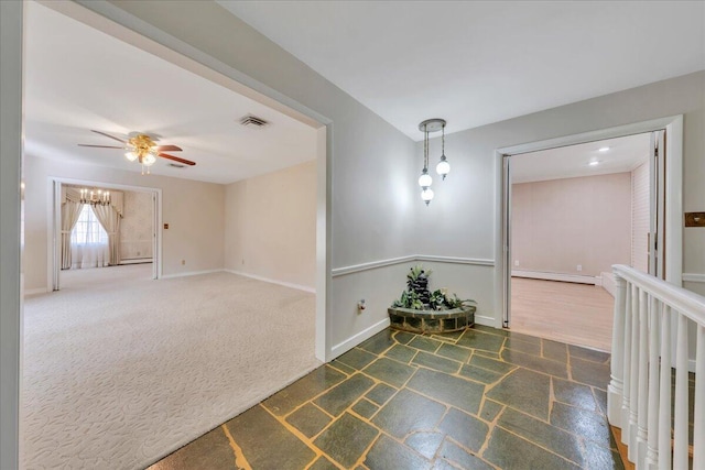 5241 N Spring Dr, Roanoke, VA 24019 - spare room with ceiling fan, a baseboard heating unit, baseboards, and a chandelier