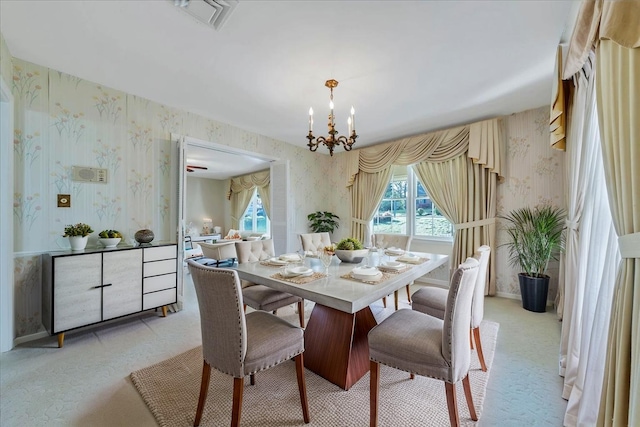 5241 N Spring Dr, Roanoke, VA 24019 - dining space featuring wallpapered walls, light carpet, a chandelier, and baseboards