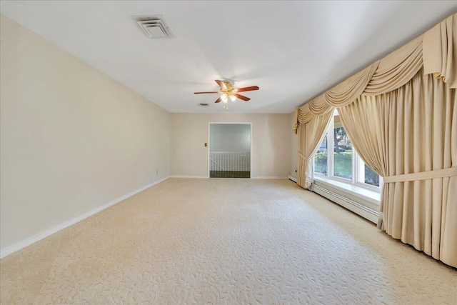 5241 N Spring Dr, Roanoke, VA 24019 - empty room with ceiling fan, baseboards, light carpet, and a baseboard radiator