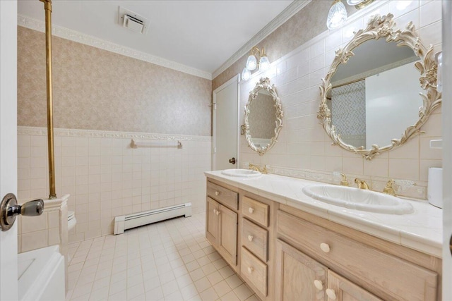 5241 N Spring Dr, Roanoke, VA 24019 - full bathroom featuring a baseboard radiator, tile walls, tile patterned flooring, double vanity, and crown molding