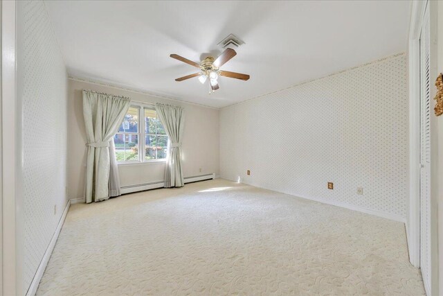 5241 N Spring Dr, Roanoke, VA 24019 - carpeted empty room with wallpapered walls, a ceiling fan, baseboard heating, and baseboards