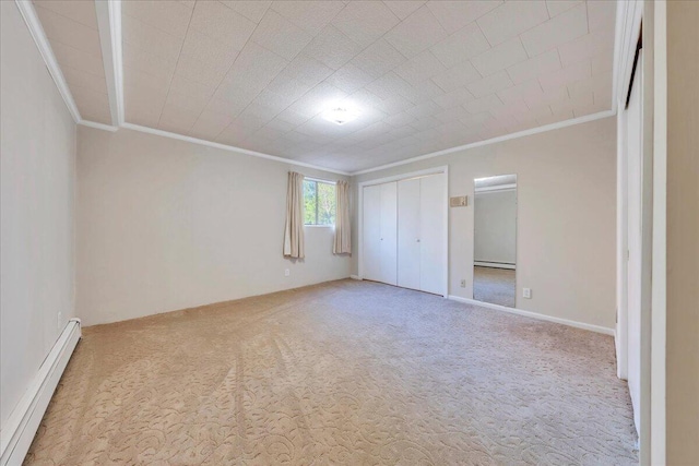 5241 N Spring Dr, Roanoke, VA 24019 - unfurnished bedroom with baseboard heating, ornamental molding, carpet flooring, and a closet