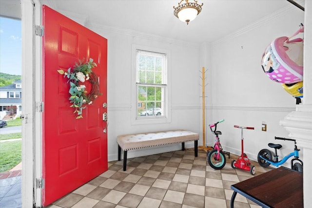 foyer entrance with ornamental molding