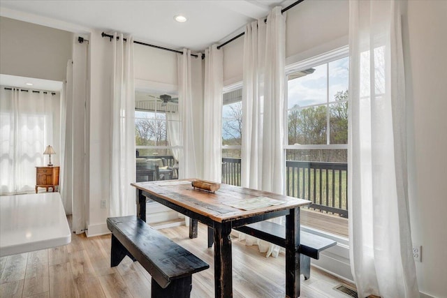 dining room featuring visible vents, light wood finished floors, and recessed lighting