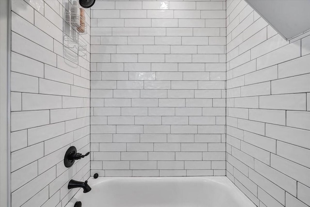 bathroom featuring  shower combination