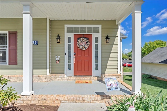 doorway to property with a porch