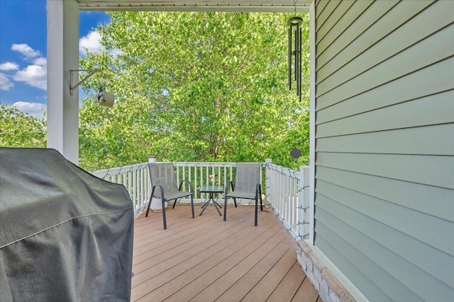wooden terrace with grilling area