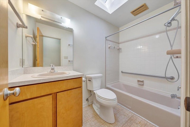 bathroom with visible vents, toilet, vanity, shower / bathtub combination, and a skylight