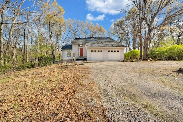 view of front facade featuring an attached garage and driveway