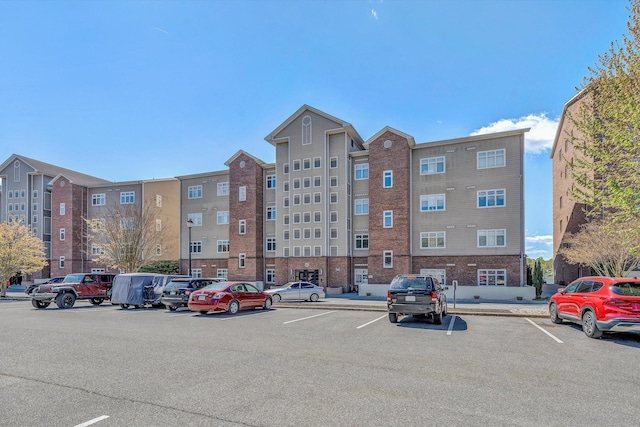 1245 Graves Harbor Trl Unit 206, Huddleston, VA 24104 - view of building exterior with uncovered parking