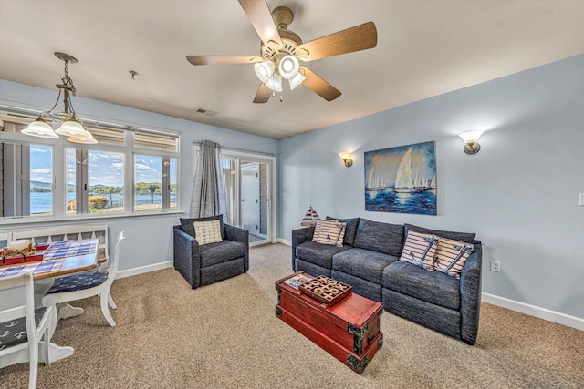 1245 Graves Harbor Trl Unit 206, Huddleston, VA 24104 - carpeted living room with baseboards and a ceiling fan
