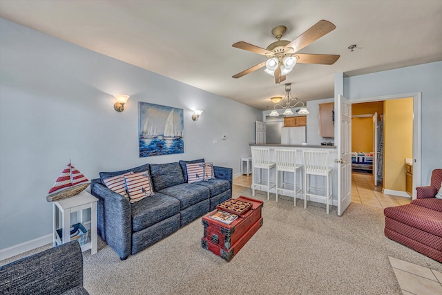 1245 Graves Harbor Trl Unit 206, Huddleston, VA 24104 - living room featuring light carpet, a ceiling fan, and baseboards