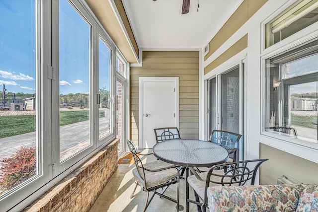 1245 Graves Harbor Trl Unit 206, Huddleston, VA 24104 - sunroom / solarium with plenty of natural light, a ceiling fan, and outdoor dining area