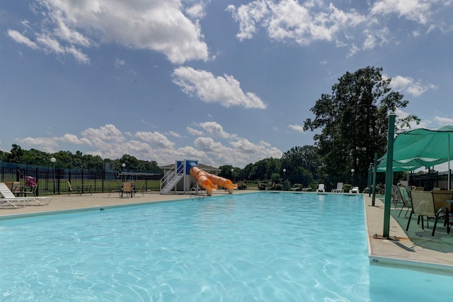 1245 Graves Harbor Trl Unit 206, Huddleston, VA 24104 - community pool featuring a water slide, fence, and a patio area