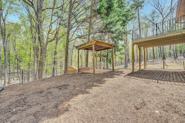 view of yard featuring a wooden deck