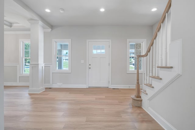 45 Island Green Rd, Daleville, VA 24083 - foyer entrance with light wood-type flooring, stairs, recessed lighting, crown molding, and ornate columns