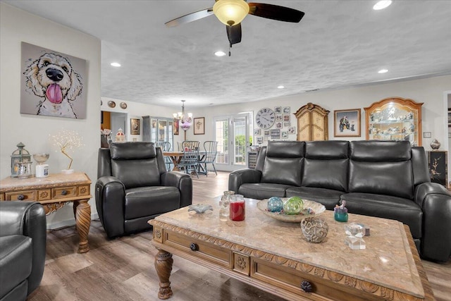 38 Point Pleasant Ave, Salem, VA 24153 - living room with recessed lighting, ceiling fan with notable chandelier, and light wood-style flooring