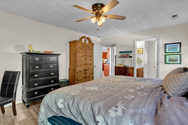 38 Point Pleasant Ave, Salem, VA 24153 - bedroom featuring ceiling fan, visible vents, light wood-type flooring, and ensuite bathroom