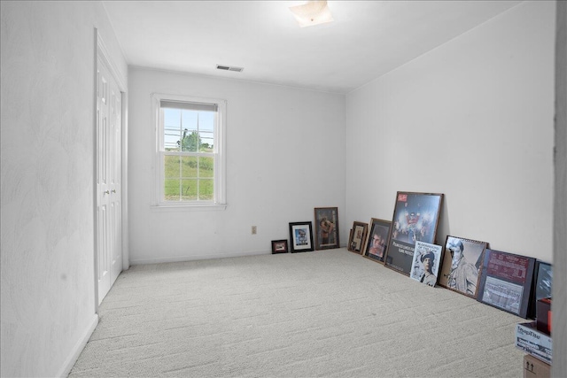 recreation room featuring carpet and baseboards