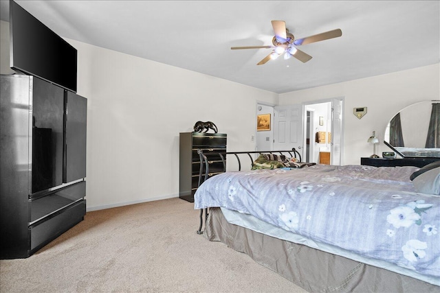 carpeted bedroom featuring baseboards