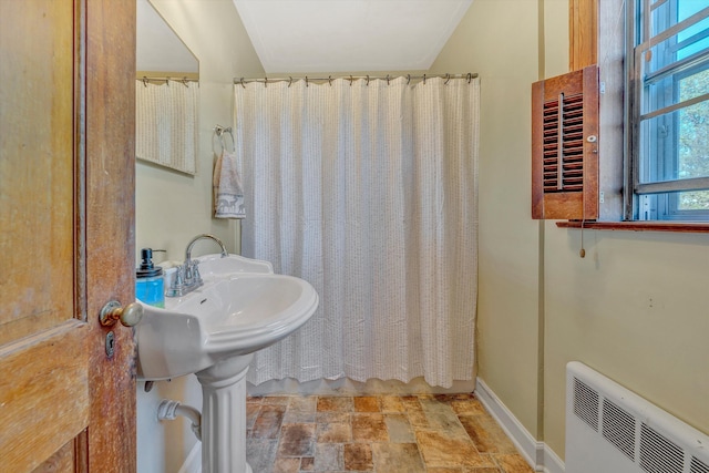 1112 Highland Rd, Salem, VA 24153 - full bathroom with stone finish flooring, a shower with curtain, and radiator heating unit