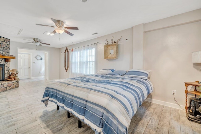2626 Avenham Ave SW, Roanoke, VA 24014 - bedroom featuring light wood-style floors, baseboards, and ceiling fan