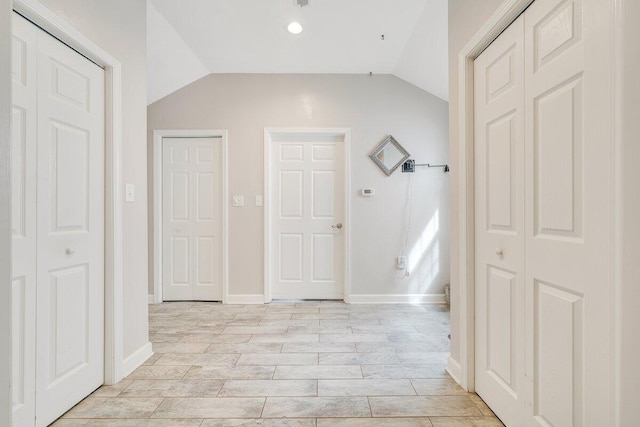 2626 Avenham Ave SW, Roanoke, VA 24014 - corridor with vaulted ceiling, baseboards, and light wood-style floors