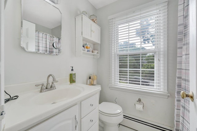 2626 Avenham Ave SW, Roanoke, VA 24014 - bathroom with a baseboard heating unit, healthy amount of natural light, vanity, and toilet