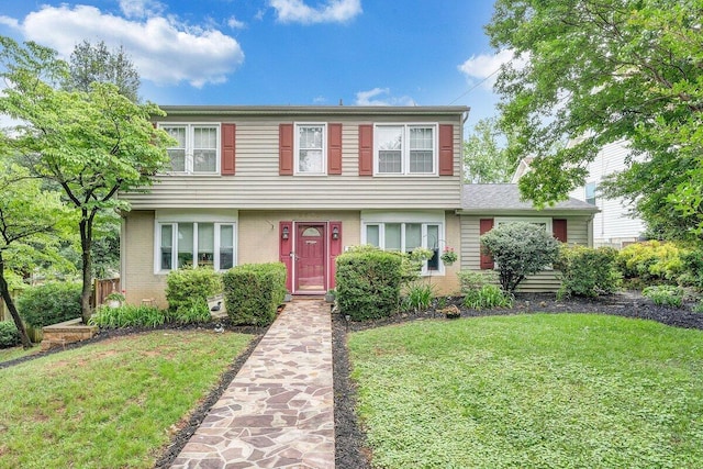 2626 Avenham Ave SW, Roanoke, VA 24014 - colonial inspired home with a front yard and brick siding