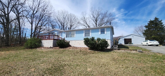 402 Mountain Meadow Dr, Vinton, VA 24179 - view of front of property with an outbuilding, a front yard, and a deck