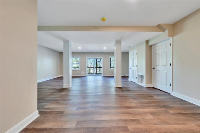 interior space with recessed lighting, wood finished floors, visible vents, and baseboards