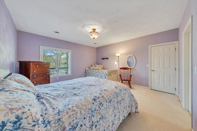carpeted bedroom with visible vents