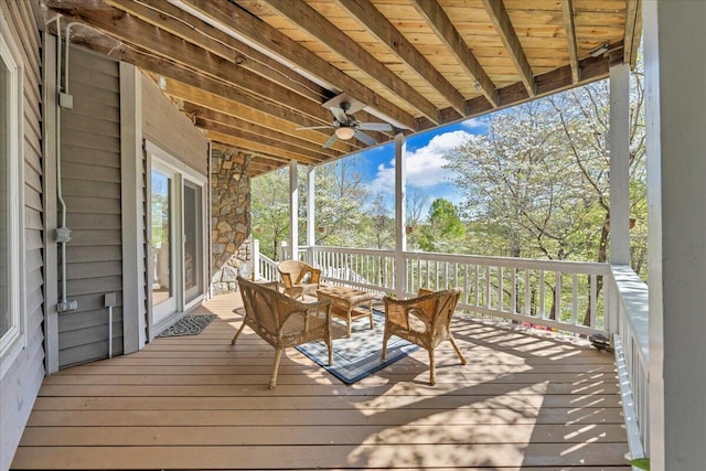 wooden terrace with ceiling fan