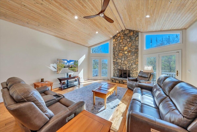 living area with french doors, wood finished floors, ceiling fan, wood ceiling, and high vaulted ceiling