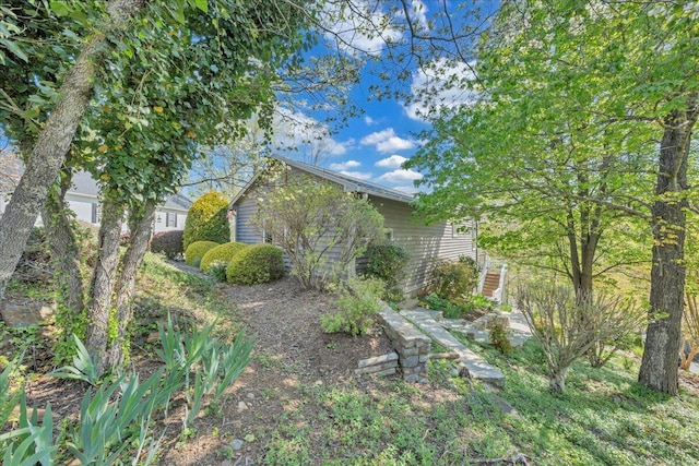 view of property exterior with stairway