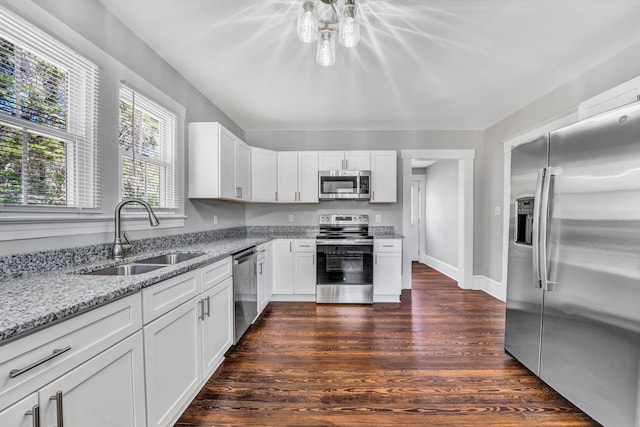 319 Trinity Rd, Troutville, VA 24175 - kitchen featuring a sink, stainless steel appliances, white cabinets, dark wood-style flooring, and light stone countertops