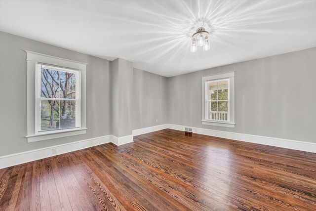319 Trinity Rd, Troutville, VA 24175 - unfurnished room with visible vents, wood finished floors, and baseboards