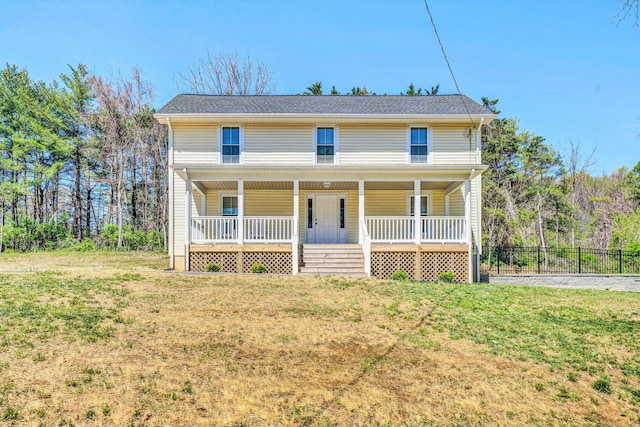 319 Trinity Rd, Troutville, VA 24175 - traditional home with fence, a front yard, and covered porch