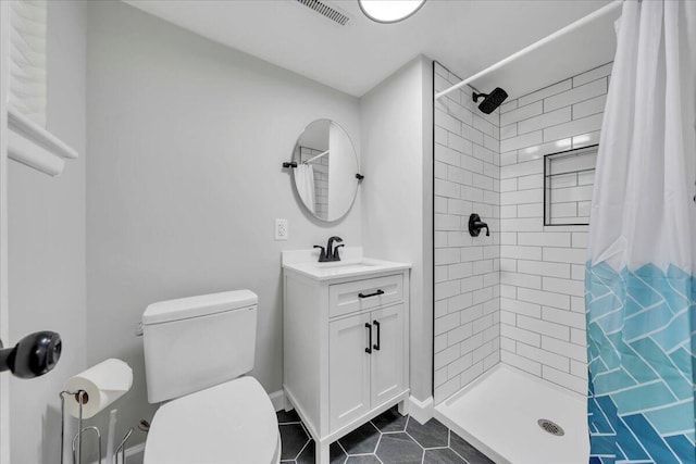 full bathroom featuring visible vents, a shower stall, toilet, and tile patterned flooring