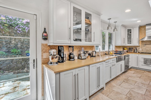 3421 Exeter St SW, Roanoke, VA 24014 - kitchen with decorative backsplash, pendant lighting, a sink, and white cabinetry