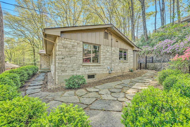 3421 Exeter St SW, Roanoke, VA 24014 - view of side of home featuring board and batten siding and stone siding