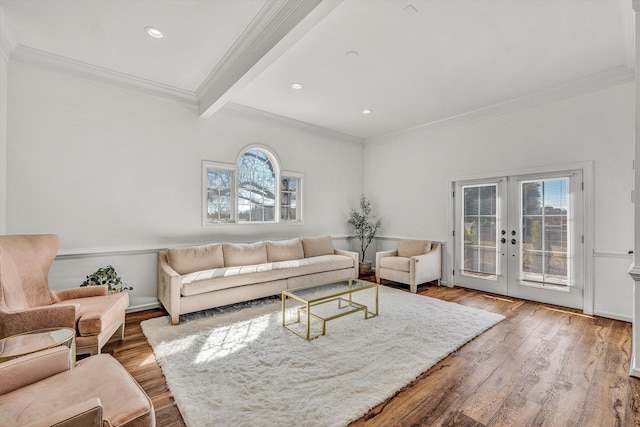 living room with ornamental molding, french doors, wood finished floors, and recessed lighting