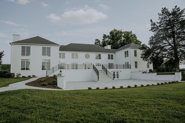 exterior space with central AC and stairs