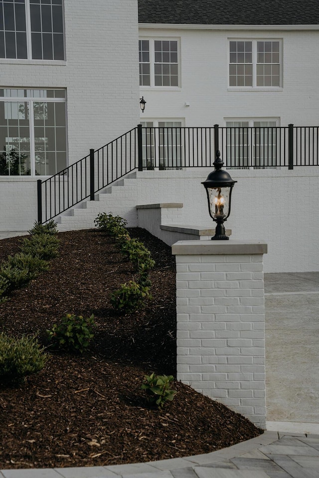 exterior space featuring brick siding