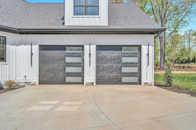 exterior space featuring a garage and concrete driveway