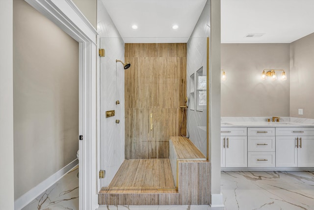 bathroom featuring visible vents, recessed lighting, marble finish floor, a shower stall, and vanity