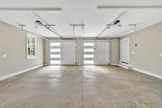 garage featuring baseboards