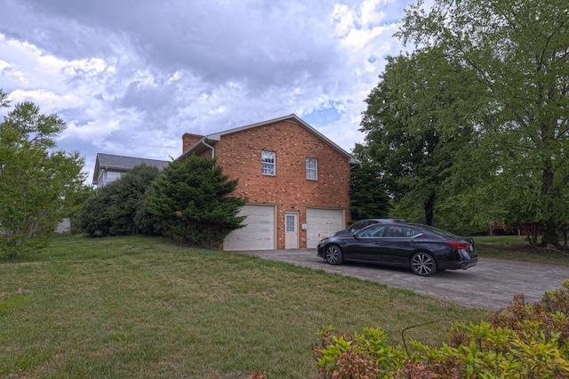 1615 Deyerle Rd SW, Roanoke, VA 24015 - view of side of home with driveway, brick siding, a garage, a yard, and a chimney