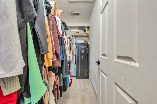 spacious closet featuring carpet floors and visible vents